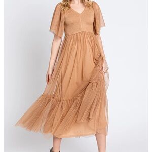 Smocked maternity dress.